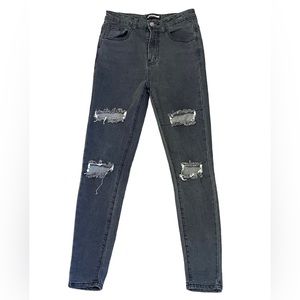 Prettylittlething brand black ripped jeans